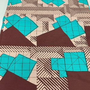 A close up of a fabric with geometric designs