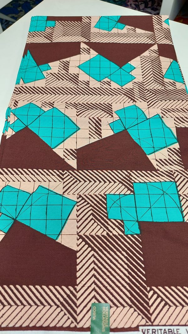 A close up of a fabric with geometric designs