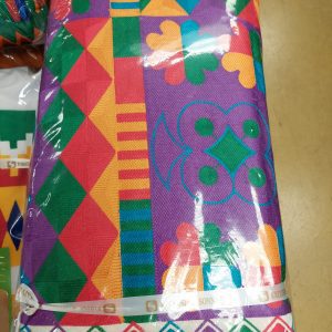 A colorful wrapping paper with designs on it.