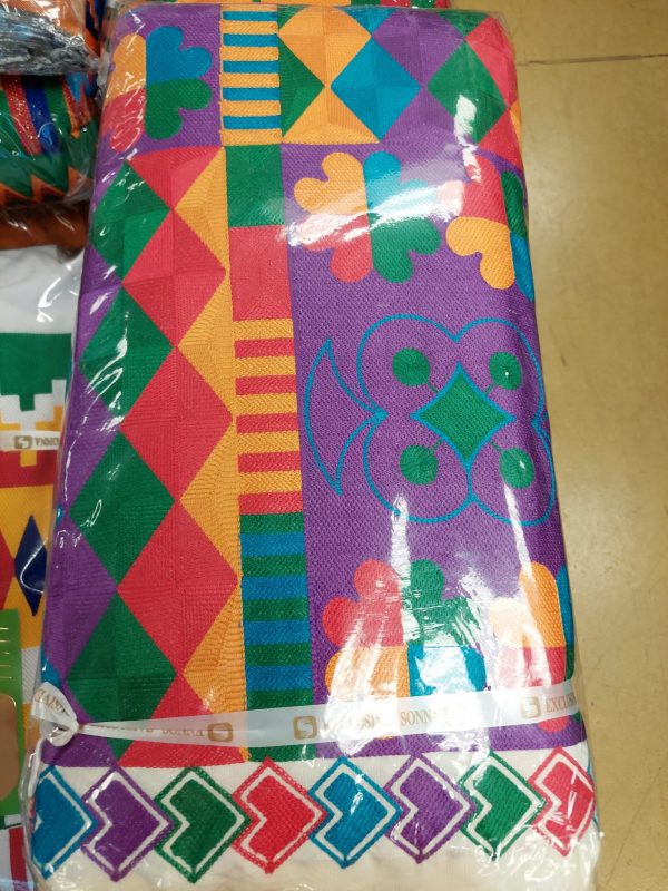 A colorful wrapping paper with designs on it.