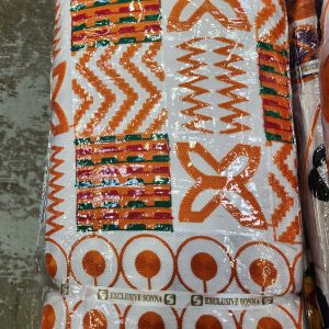 A close up of an orange and white pattern