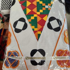 A white jacket with various designs on it.