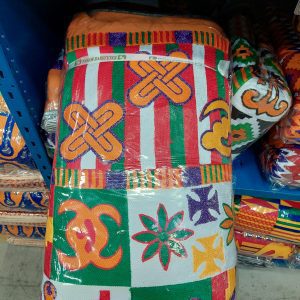 A colorful chair with many designs on it.