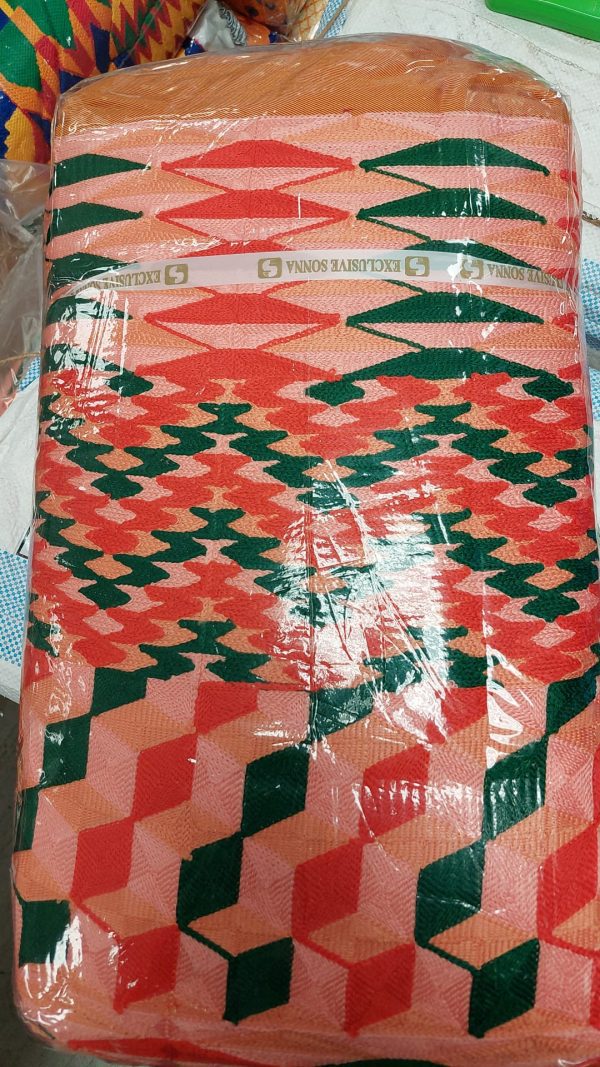 A red and green pattern is wrapped in plastic.